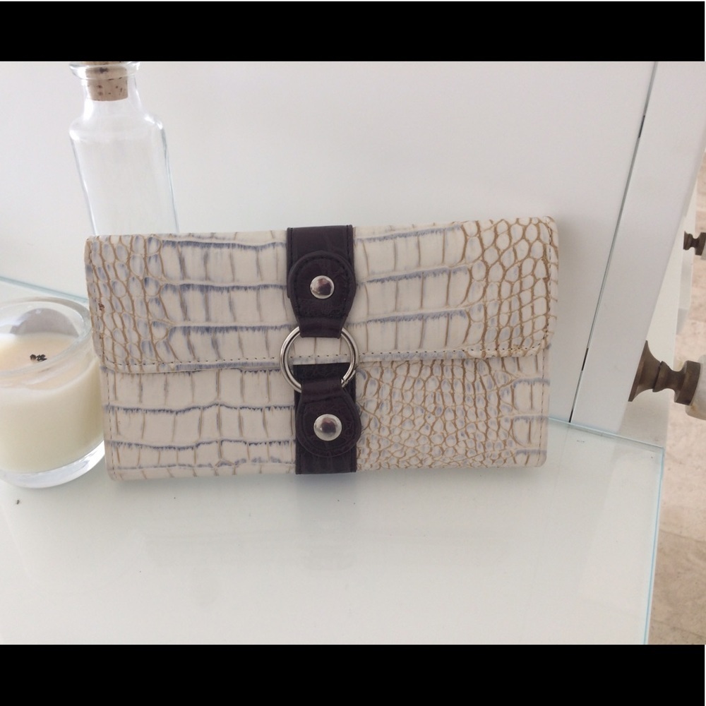 Lightly used beautiful animal print clutch/wallet!